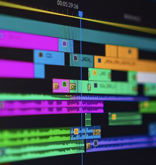 A video editing timeline with layered picture and audio tracks